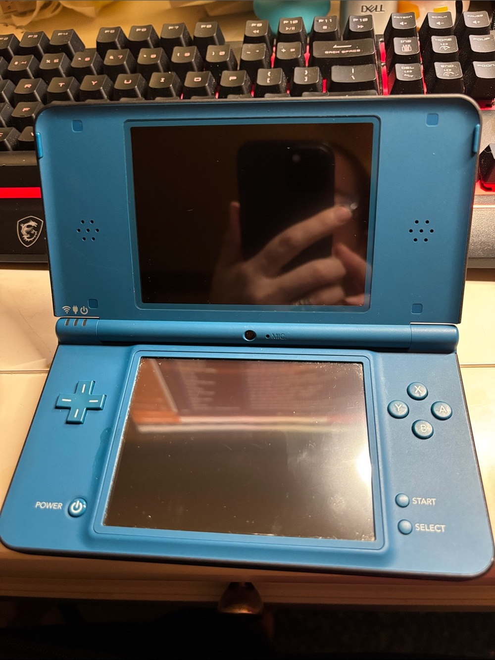 Nintendo DS Lite in Ice Blue & Nintendo DSi XL in a matte blue finish (Set of 2)